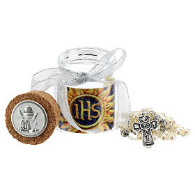 White rosary in a glass jar, Holy Communion