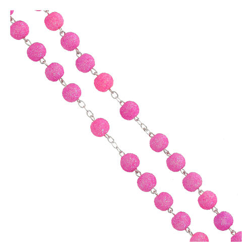 Rosary with glittery fuchsia plastic beads of 0.2 in 3