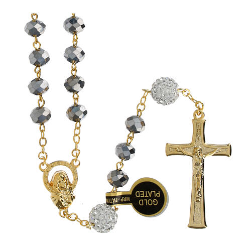 Golden rosary with dull silvery beads of 0.2 in 1