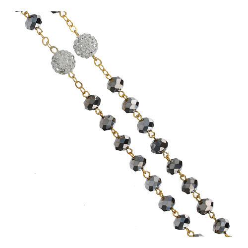 Golden rosary with dull silvery beads of 0.2 in 3