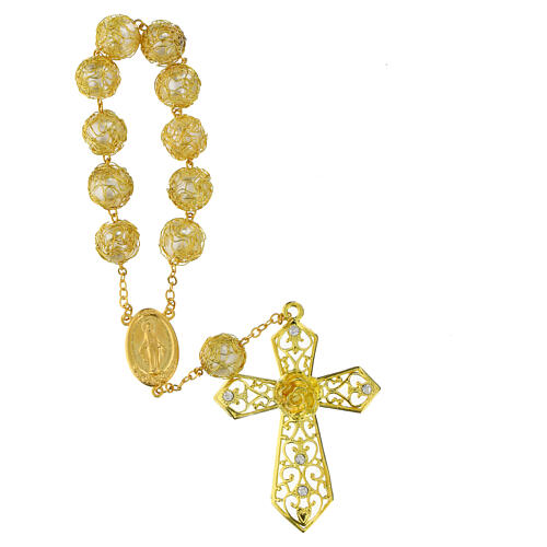 Golden single decade rosary bracelet with synthetic pearls of 0.6 in 1