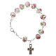 Rosary bracelet with 5x5 mm faceted white grains and roses, chain with fastener s1