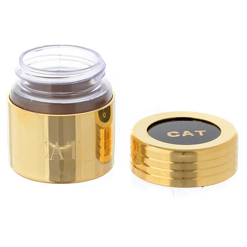 Ölgefäß aus Kunststoff mit vergoldeter Messing-Ummantelung Beschriftung CAT 2