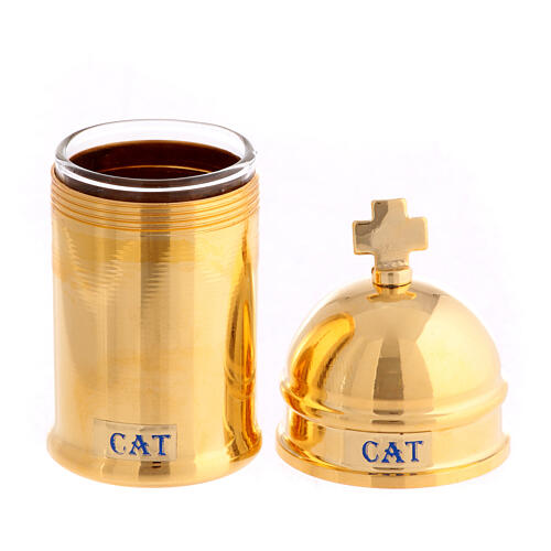 Ampoule dorée 30 ml étui imitation cuir huile Catéchumènes 2