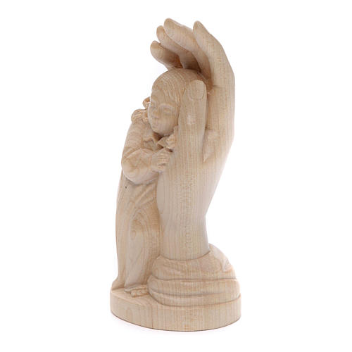 Protective hand with young girl in natural wax Valgardena wood 2