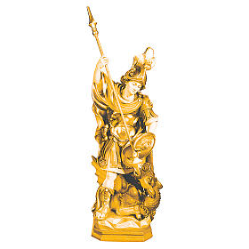 Saint George wooden statue in shades of brown with spear and dragon