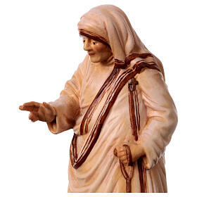 Mother Theresa of Calcutta wooden statue in shades of brown