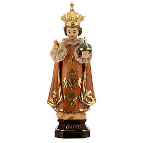 Infant Jesus of Prague wooden statue in shades of brown