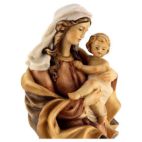 Our Lady of the Heart wooden statue in shades of brown
