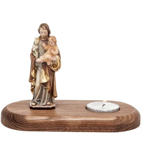 Saint Joseph with votive candle 1