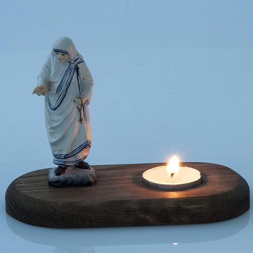 Mother Therese with votive candle 2