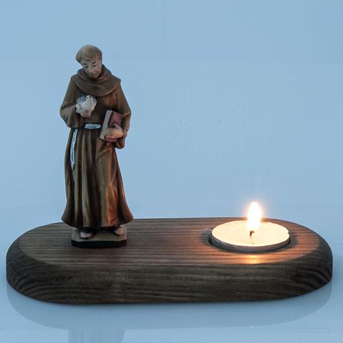 Saint Francis of Assisi with votive candle 2