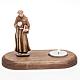 Saint Francis of Assisi with votive candle s1