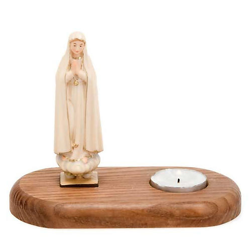 The Virgin of Fatima with votive candle 1