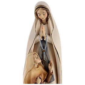 Our Lady of Lourdes with Bernadette wooden statue painted