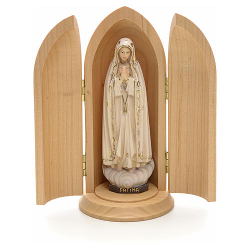Our Lady of Fatima wooden statue painted in niche 1