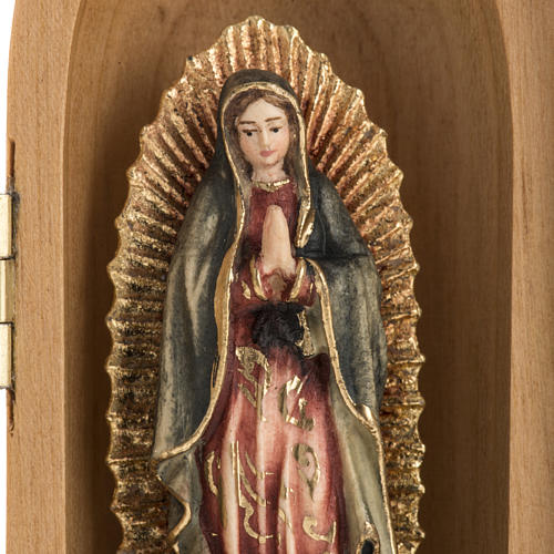 Our Lady of Guadalupe wooden statue painted in niche 3