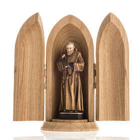 Padre Pio wooden statue painted in niche