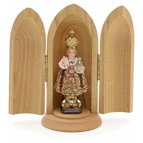 Infant of Prague wooden statue painted in niche 1