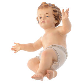 Baby Jesus wooden figurine with opened arms and white drape