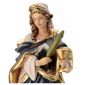 Statue de Sainte Odile en bois peint branche et calice