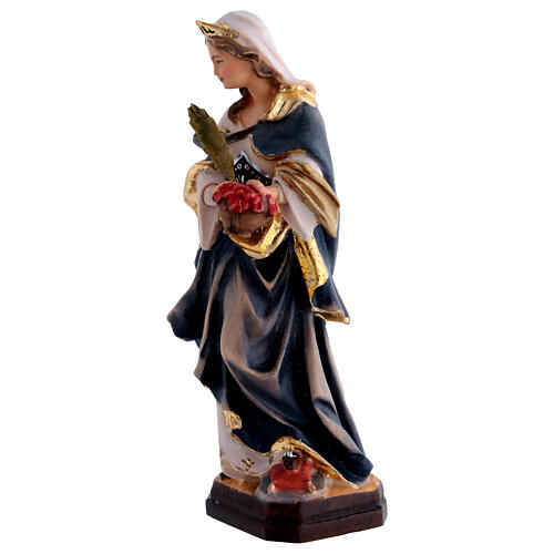 Santa Dorotea de madera pintada con vestido azul y flores rojas 3