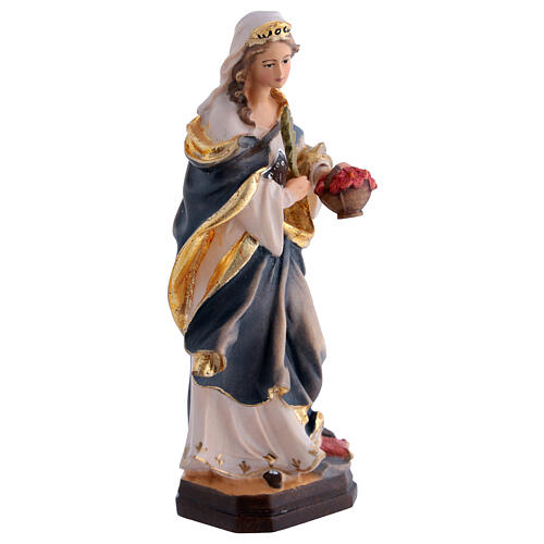 Santa Dorotea de madera pintada con vestido azul y flores rojas 5