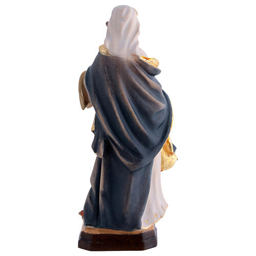Santa Dorotea de madera pintada con vestido azul y flores rojas 6