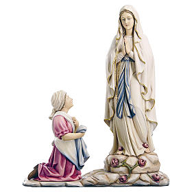 Imágenes de Madera Pintada: Estatua de la Virgen de Lourdes con Bernadette de madera pintada de la Val Gardena