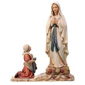 Estatua de la Virgen de Lourdes con Bernadette de madera pintada de la Val Gardena