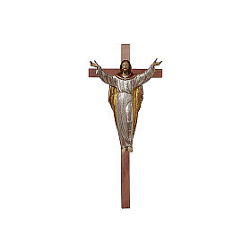 Resurrected Jesus Christ statue in natural wood on cross