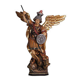 Saint Micheal statue in coloured wood of Val Gardena
