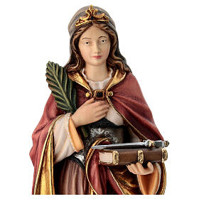 Saint Regina with sword in painted maple wood of Valgardena