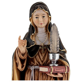 Painted statue in wood Saint Gertrude with feather, Val Gardena 