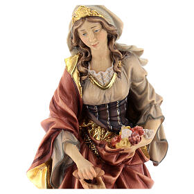 Statue of St. Elizabeth of Hungary with beggar and bread in painted wood from Val Gardena