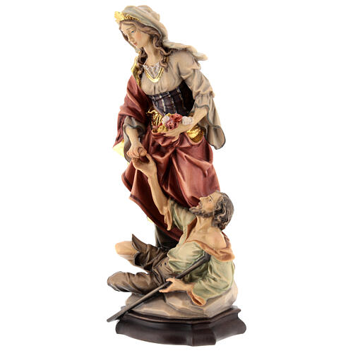 Statue of St. Elizabeth of Hungary with beggar and bread in painted wood from Val Gardena 4