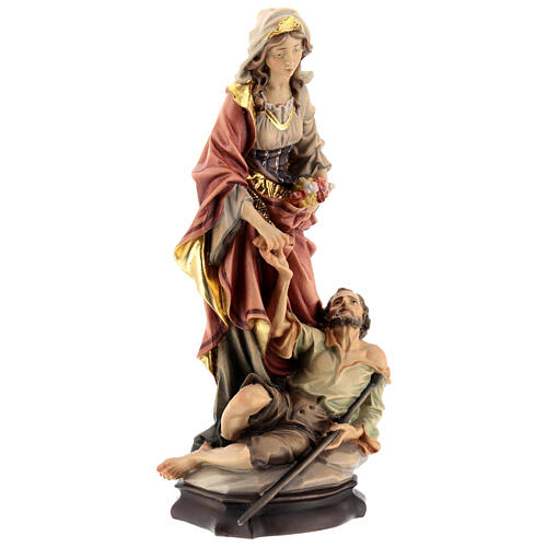 Statue of St. Elizabeth of Hungary with beggar and bread in painted wood from Val Gardena 6
