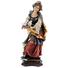 Statue of St. Silvia with lily in painted wood from Val Gardena