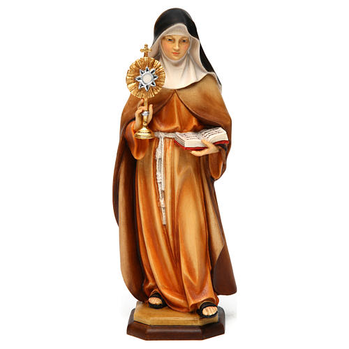 Statue of St. Claire of Assisi with monstrance in painted wood from Val Gardena 1