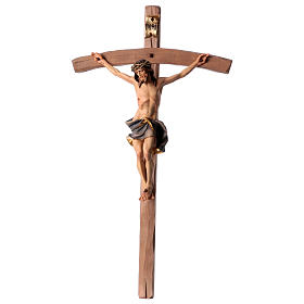 Crucifix in wood, curved cross and blue garment, Val Gardena