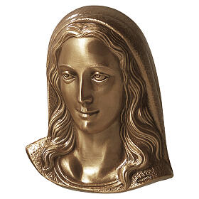 Bronzed outdoor plaque of Our Lady, facing right
