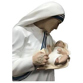 Estatua Madre Teresa de Calcuta con niño fibra de vidrio 60 cm