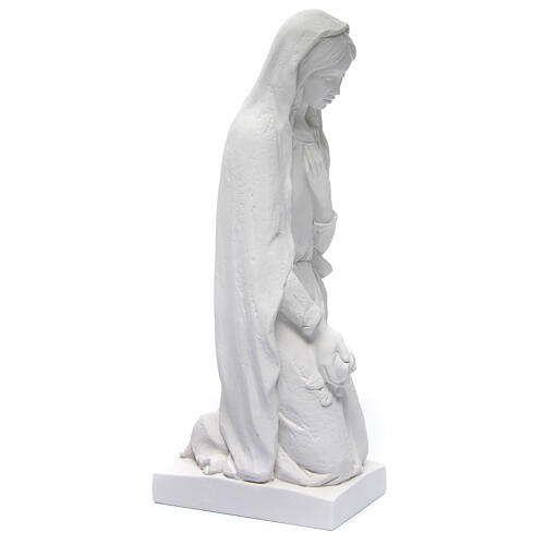 Angel with flowers and hand on heart in white Carrara marble 23 inc. 7