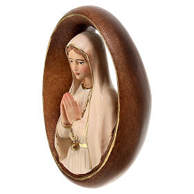 Oval sculpture of Our Lady of Fatima, painted wood of Val Gardena