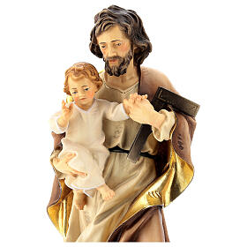 Heiliger Josef mit dem Jesuskind, Ahornholz, in Braun- und Beigetönen koloriert, Grödnertal