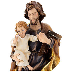 Heiliger Josef mit dem Jesuskind und einem Winkel, Ahornholz, in gedeckten Tönen koloriert, Grödnertal