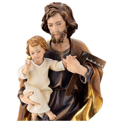 Heiliger Josef mit dem Jesuskind und einem Winkel, Ahornholz, in gedeckten Tönen koloriert, Grödnertal 2