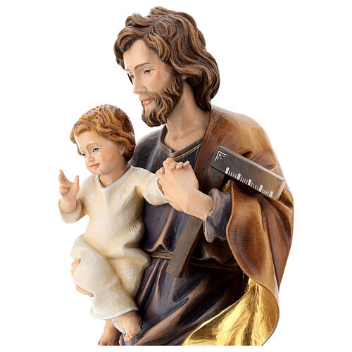 Heiliger Josef mit dem Jesuskind und einem Winkel, Ahornholz, in gedeckten Tönen koloriert, Grödnertal 4
