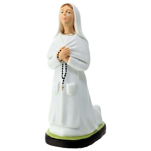 Statue of Bernadette, fluorescent unbreakable material, 10 in 3