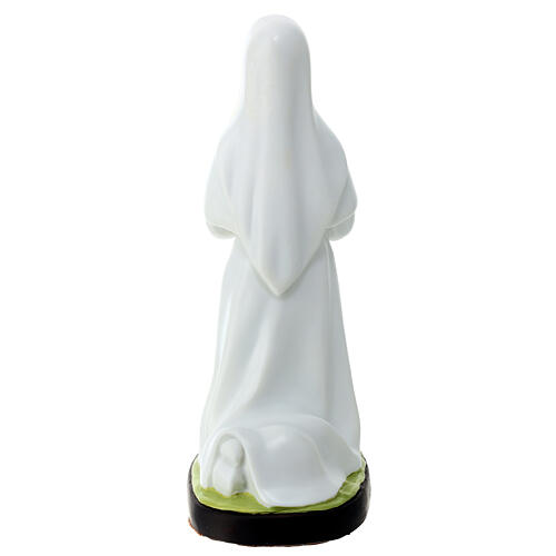 Statue of Bernadette, fluorescent unbreakable material, 10 in 4